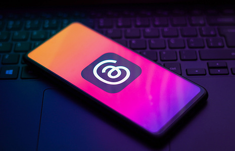 In this photo illustration, the Threads logo is displayed on a smartphone screen. Threads is the new social network from Meta Platforms which was launched on the 5th of July 2023. According to Meta CEO Mark Zuckerberg, the Threads app is designed to rival Twitter. As of 6th of July 2023, the Thread app already has 10 million users.