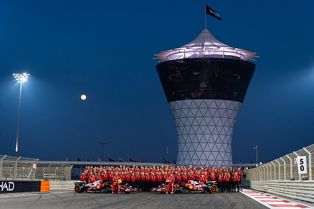 Scuderia Ferrari HP F1 drivers pose during the Formula 1 Abu Dhabi Grand Prix 2025 at Yas Marina Circuit.