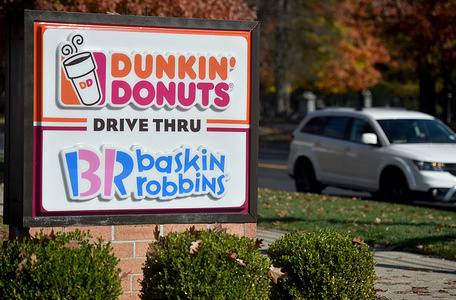Dunkin' Donuts sign at their store in Kingston.
Dunkin Donuts / Baskin Robbins has been bought by Inspire brands which own Buffalo Wild Wings and Arby's.
