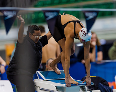 Alexa Leary and her starting assistant readies herself for the start of the 100m Freestyle Final at the 2025 Sydney Open and UniSport Nationals Meet. Australian Paralympian Alexa Leary set a new world record in Sydney in May 2025 breaking the S9 100m freestyle world record twice at the 2025 Sydney Open and UniSport Nationals Meet. Leary set a new world record in the S9 100m freestyle in a heat in a time of 59.07s before lowering the record again in the final in a time of 58.89s.
