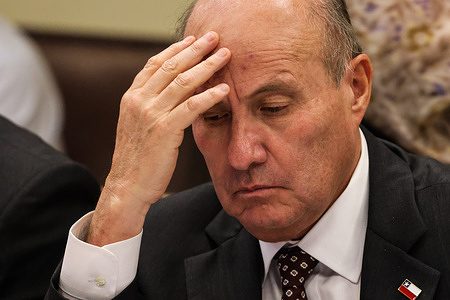 Chilean Finance Minister Jorge Quiroz Castro seen during a committee meeting at the National Congress.