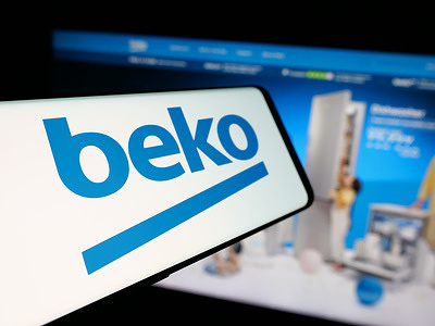 In this photo illustration, a smartphone with the logo of Turkish electronics company Beko Elektronik is seen on screen in front of website.
