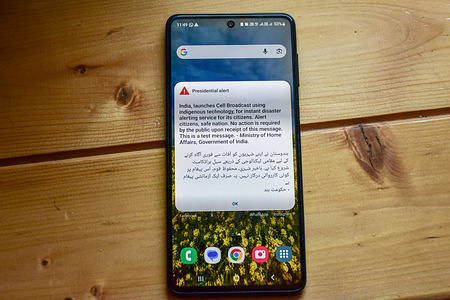 A message pops up on the phone screen during a drill following the launch of an emergency messaging system. India has launched its Cell Broadcast messaging system using indigenous technology for instant disaster alerting service for its citizens. Millions of mobile phones across India buzzed for several seconds as part of a government trial of a mobile-based disaster alert system.