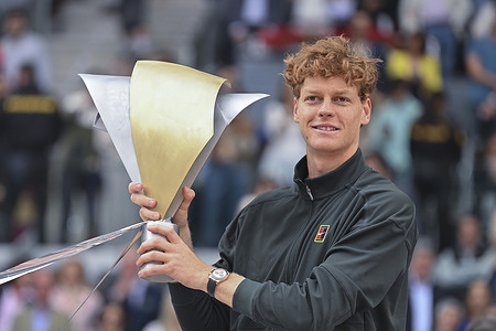Jannik Sinner of Italy poses with the trophy in the men's final of the Mutua Madrid Open 2026 tournament, held at La Caja Mágica on May 3, 2026 in Madrid, Spain. Jannik Sinner won 6-1, 6-2
