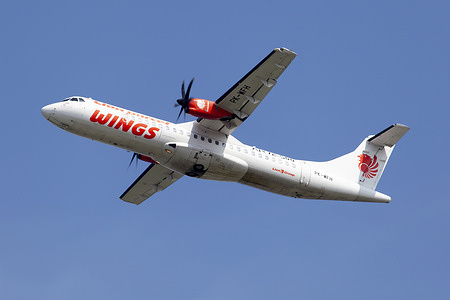 A Wings Air ATR 72 leaves Denpasar Bali Ngurah Rai airport. Wings Air, is a low-cost airline based in Jakarta, Indonesia operating commuter and regional flight in Indonesia from the airport hub of Makassar.
The airline is a subsidiary of Lion Air and started operations on 2003
