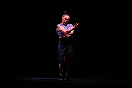 Spanish flamenco dancer and choreographer Rocío Molina performs on stage during her show "Calentamiento" at the Cervantes Theatre. As part of the flamenco dance season, Rocío Molina presented her new choreography "Calentamiento", which explores the physical and symbolic transformation of the body based on the concept of "warm-up." Rocío Molina is a leading international figure in contemporary flamenco and an award-winning artist.