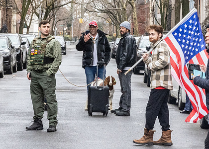 Jake Lang, on left, was a pardoned January 6 capitol rioter holding a hate rally in the upper east side of Manhattan near Gracie Mansion, stands with his supporters and a goat His mission was to "stop the Islamification' of NYC. The goat has been his companion as he disparages Muslim New Yorkers.