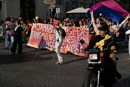 Participants walk along the streets of Marseille during the Lesbian Visibility March.
