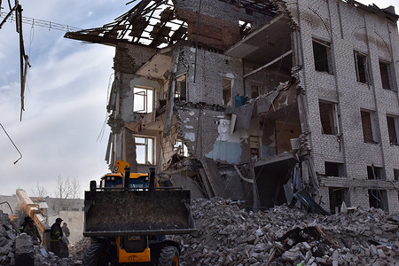 Ukrainian State Emergency Service firefighters seen during the inspection of a heavily damaged municipal building following the Russian air strike in Orikhiv. Orikhiv is a small town near Zaporizhzhia, which serves as the last pillar of resistance for Ukrainian army soldiers in the south, as Russian armed forces continue to advance to the liberated Robotyne. Home to around 700 people, Orikhiv's citizens risk their lives enduring the daily air bomb and artillery attacks as they struggle to survive.