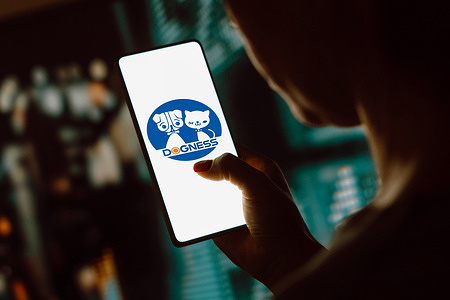 In this photo illustration, the Dogness International Corporation logo is displayed on a smartphone screen.