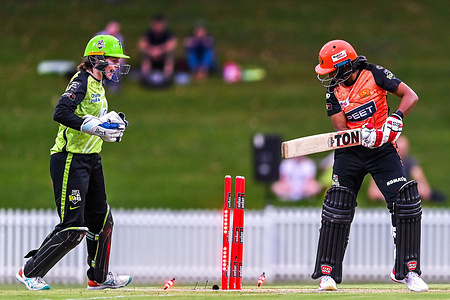 Dayalan Hemalatha (R) of Perth Scorchers is bowled out by Chamari Athapaththu of Sydney Thunder (L) during the Women's Big Bash League match between Sydney Thunder and Perth Scorchers at Drummoyne Oval. Perth Scorchers won the Women's Big Bash League match against Sydney Thunder by 74 runs. Perth Scorchers: 171/7 (20 overs), Sydney Thunder: 97/10 (19.3 overs).