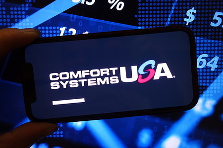 In this photo illustration, the Comfort Systems company logo is seen displayed on a smartphone screen.