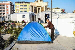 Hatay, Turkey - 14/02/2023 16:23:00: A man is seen setting up a tent in a relief shelter. Turkey and Syria have experienced the worst earthquakes to strike the region in almost a century. A 7.8-magnitude quake struck southeastern Turkey, which was followed by a second quake of 7.7 in northern Syria. More than 30,000 people are reported to have died due to the quakes, and the death toll is still rising.