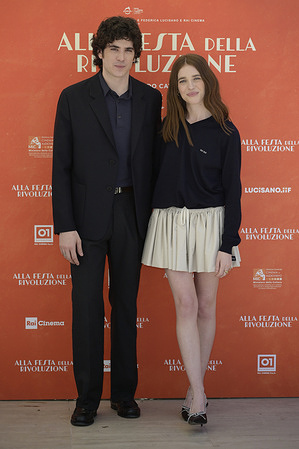 Nicolas Maupas (l) and Valentina Romani (r) attend the photocall of movie Alla festa della rivoluzione at Cinema Barberini terrace.
