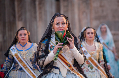 Falleras dressed up in traditional costume prepare to present flowers to the Virgen de los Desamparados (Our Lady of the Forsaken) during Las Fallas Festival in Valencia. Fallas are huge sculptures depicting famous personalities or current events in the streets of Valencia which can be seen during the ‘Las Fallas’ Festival, the sculptures will be then burn on March 19, 2019 as a tribute to Saint Joseph, patron saint of the carpenters' guild.