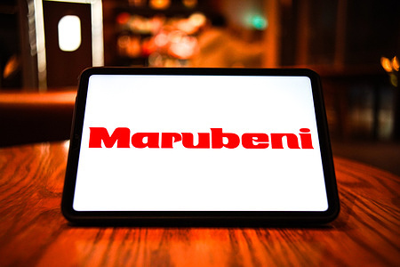 In this photo illustration, the logo of Marubeni is displayed on the screen of a smart tablet.
