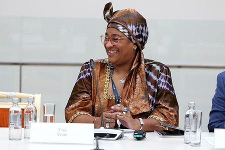 Oumy Sene, Secretary General Russian Cultural Center Kalinka seen during a session on Educational Institutions in Shaping the Global Cultural Space the framework of the XI St. Petersburg International Forum of United Cultures.