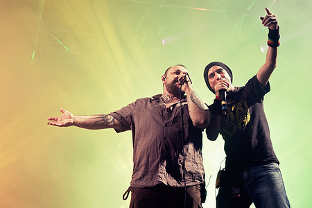 (From L-R) 'O Zulù (Luca Persico), Valerio Jovine perform on stage at Città dell'Altra Economia.
99 Posse perform on stage at Città dell'Altra Economia in Rome.
