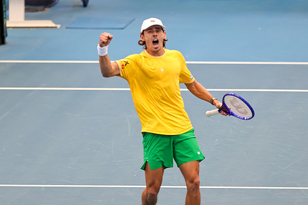 Australian Davis Cup player Alex De Minaur celebrates after breaking serve during his match against Poland's Maks Kasnikowski (Not seen) in the first rubber of the World Group I round being held at Pat Rafter Arena. De Minaur won the match 6-3, 6-0 for Australia to go 1-0 up.