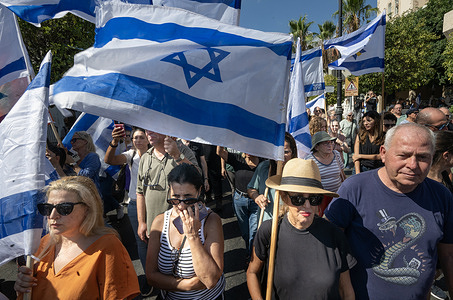 Hundreds of people gather to accompany Idan Shtivi's family during his funeral procession. The funeral of the hostage who was killed in Hamas captivity Idan Shtivi, whose body was returned by the Israel Defense Forces (IDF) , Hundreds of people gathered to accompany Idan Shtivi's family during his funeral .