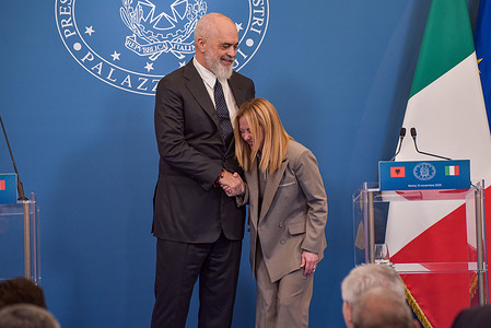 Italian Prime Minister Giorgia Meloni (L) and Albanian Prime Minister Edi Rama (R) shake hands during the 1st Italy-Albania Intergovernmental Summit at Villa Doria Pamphilj.