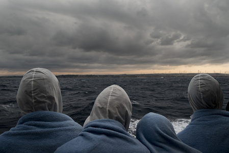 Migrants looking to Italy after being rescued in the SAR zone. They were coming from Libya and rescued by the Spanish NGO Proactiva Open Arms.
The Spanish NGO Proactiva Open Arms rescued 378 migrants. They were 20 miles out from the Libyan coast. Since the beginning of the year, nearly 3.000 people have lost their lives in the Mediterranean Sea. Even if one of every 53 has died crossing, migrants keep on trying to leave Libya because they say that life in Libya is really difficult.