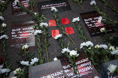 Flowers seen at the memorial in Yangon for Mya Thwe Thwe Kine, a protester who died from brain injury after a shot on the head in Nay Pyi Daw during the anti coup demonstrations.