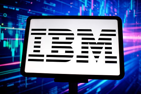 In this photo illustration, the International Business Machines Corporation (IBM) logo is displayed on a tablet screen.