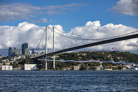 Red Bull athlete Italian pilot Dario Costa passed under the July 15 Martyrs Bridge in Istanbul. 
The bridge was closed to sea traffic for a short time.