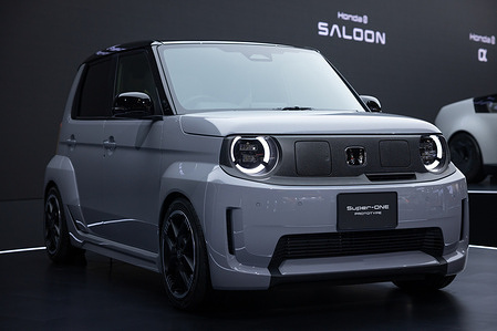 Honda Super-One Prototype on display at Japan Mobility Show 2025. Tokyo's Big Sight pulses with the roar of innovation as the Japan Mobility Show 2025—rebranded heir to the storied Tokyo Motor Show—unfolds from October 30 to November 9, drawing global eyes to Japan's evolving automotive ethos. Amid whispers of an EV slowdown, exhibitors pivot boldly: futuristic compact concepts, expanded luxury lines, and kei-sized electric runabouts nod to market-specific electrification. Manga-inspired booths spotlight refreshed minivans and autonomy-ready compacts, blending whimsy with wired tech. Yet, the narrative diverges from 2023's full-throttle EV fervor. Hybrids and performance icons reassert Japan's "I told you so" on balanced powertrains, tempered by software and sustainability hurdles. Interactive gems abound: mini-mobility careers for tots, kei-truck bazaars hauling regional wares, and a "future tour" immersing visitors in 2035's seamless lifestyles. This biennial bazaar isn't just vehicles; it's a manifesto for "Mobility for All," challenging the world to redefine roads less traveled.