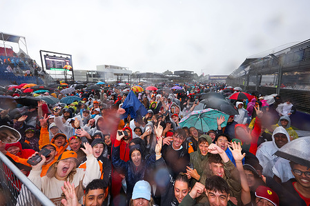 Fans celebrate on the track after the the F1 Grand Prix of Australia at the Albert Park Grand Prix Circuit.