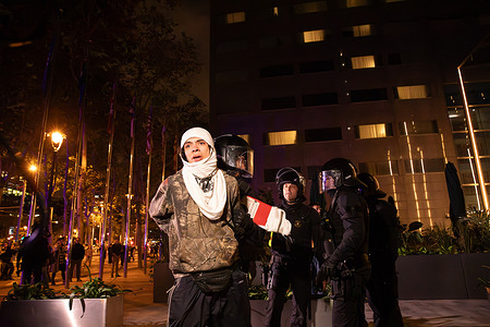 A protester seen detained by police. Thousands of protesters took to the streets in a nationwide general strike in solidarity with Palestine. Demonstrations led to road blockades, public transport disruptions, and clashes between protesters and police in several parts of the city. The strike called by pro-Palestinian groups and unions demanded an end to support for Israel and greater action from the international community.