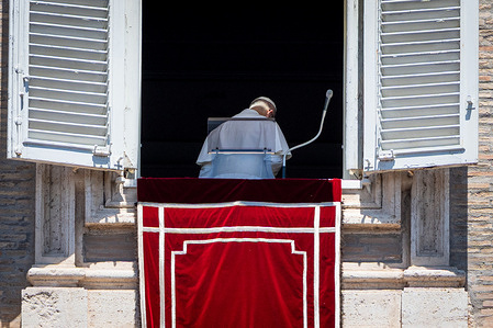 Pope Leo XIV greets the faithful at the end of the traditional Sunday Regina Caeli Prayer from the window of the Apostolic Palace overlooking St. Peter's Square.