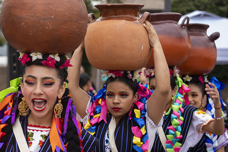 Dancers in traditional dress perform during a Cinco de Mayo celebration at Mariachi Plaza in Los Angeles, Monday, May 5, 2025. Cinco de Mayo is an annual celebration held on May 5th that commemorates the Mexican army’s victory over French forces at the Battle of Puebla in 1862. Though a relatively minor holiday in Mexico, it has grown into a major cultural event in the United States, especially among Mexican-American communities, celebrating Mexican heritage with parades, music, food, and folkloric traditions.