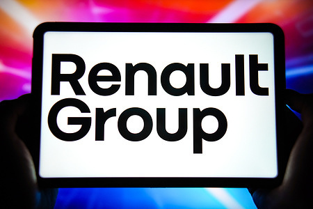 In this photo illustration, the Renault Group logo is displayed on the screen of a smart tablet.