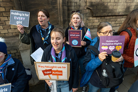 Protesters hold placards expressing their opinion during the demonstration. Protesters gathered outside Girlguiding UK headquarters in London after the organisation announced that transgender girls would no longer be allowed to participate in Girlguiding activities. Trans rights activists and allies condemned the policy as discriminatory, calling for inclusion, equality, and the reversal of what they described as an exclusionary decision affecting Tran’s youth.