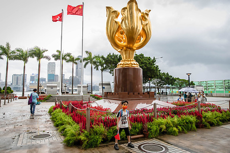 A child seen posing for a photo at the Golden Bauhinia Square during the China National Day. China marks the 73rd anniversary of its founding on October 1.