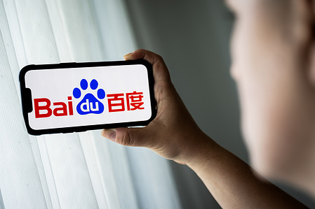 In this photo illustration, a Baidu logo is seen displayed on a smartphone.