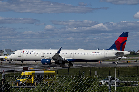 A Delta Airlines Airbus A321-211 tail number N394DX airplane taxiing to the runway for takeoff at LaGuardia Airport in the Queens borough of New York City.