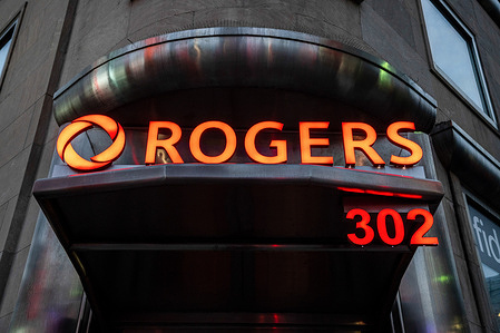A Rogers Communications sign seen in front of one of their downtown offices. One week after the nationwide Rogers network outage affected the cellular and internet service for millions of Canadians on July 8, 2022, the company continues to face backlash after promising a five-day refund for customers as a compensation.