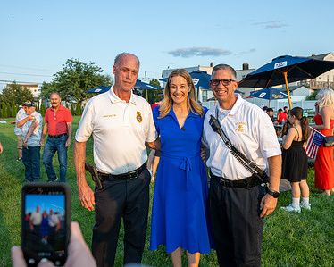 Rep. Mikie Sherrill poses for a photo with Kearny’s Police Chief Scott Macfie (left) and Fire Chief Joseph P. Mastandrea. Rep. Mikie Sherrill, D-N.J a candidate for New jersey governor, visited Kearny, NJ on the Fourth of July with Mayor Carol Jean Doyle, stopping at the town’s veterans service organizations—the VFW, American Legion and Marine Corps League West Hudson Detachment—to thank local veterans. Sherrill also greeted residents at Veterans Memorial Field during the town’s Independence Day celebration.