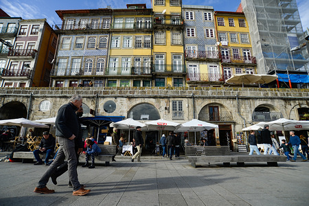 Tourists and locals seen walking with in the historical neighbourhood of Ribeira.
In 2018, Porto entered the list of the 100 most visited cities in the world in a ranking prepared by Euromonitor International. In 2018 it is estimated that the number of tourists reached 2.39 million.