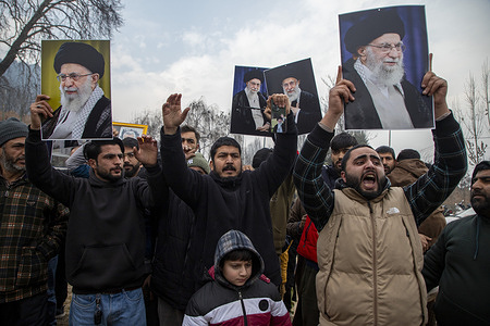 Kashmiri Shiite Muslims holding portraits of Iran’s supreme leader Ayatollah Ali Khamenei chant slogans as they take part in a protest against Israel and the United States in solidarity with Iran in Srinagar, Indian administered Kashmir. Iran has been gripped by waves of protests in recent months over economic and political grievances, with authorities saying dozens of people were killed and hundreds detained, blaming much of the violence on what they describe as terrorist groups and foreign-backed agitators, claims disputed by rights organisations. The unrest has drawn international criticism, with the United States and several European governments urging restraint, while Tehran has accused foreign powers of interference as regional tensions continue to simmer.