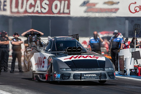 Matt Hagan from team Tony Stewart takes off in the championship race to finish the Lucas Oil NHRA Winternationals. Professional Drag racers nationwide rally together to compete at the Lucas Oil NHRA Winternationals held at the In-N-Out Burger Pomona Dragstrip for the 63rd consecutive year. Drivers battled over a three-day period starting on March 31st and concluding on April 2, fighting to take the titles in each of their divisions.