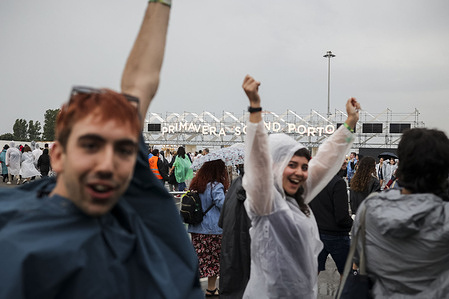 Festival goers at the entrance on the 2nd day of Primavera Sound music Festival held at the city park in Porto Portugal on 7 of june, 2024. Bad weather forces the cancellation of concerts at Primavera Sound Porto 2024. Porto is on yellow alert due to the weather. Friday and Saturday preview to have heavy wind and rain on all north coast. The organization delayed and canceled some concerts on Super Bock stage. Bad weather forces the cancellation of concerts at Primavera Sound Porto 2024.