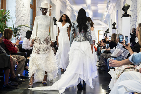 A model walks the runway wearing a design by Adlib Ibiza during the MadridEsModa Fashion Week de at Madrid Arena.