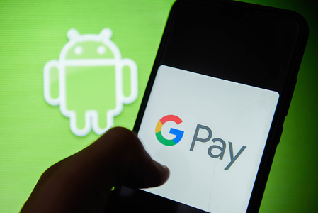 Google Pay logo is seen on an android mobile phone.