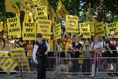 Anti-monarchist protesters of the Republic group hold their placards and chant slogans during the military parade. The Trooping the colour is an annual military parade on the Mall in London, UK. During the parade the people celebrate the monarch's state birthday in June for more than 260 years.