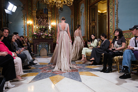 A model showcases creations by Susana Hidalgo during the Atelier Couture bridal catwalk within Madrid Fashion Week, at Santa Isabel Palace in Madrid.