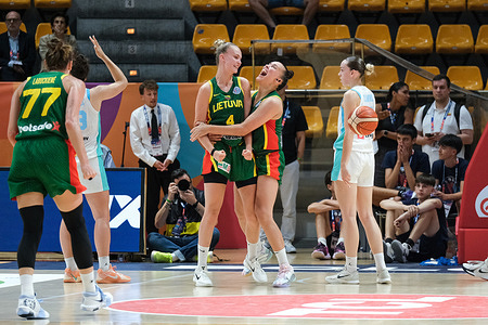 (L) Justė Jocytė 4 (LTU) and (R) Kamile Nacickaite Van Der Horst 6 (LTU) seen during the Group B match between Slovenia and Lithuania at the FIBA Women's EuroBasket 2025 at PalaDozza. Final score Lithuania 77 : 71 Slovenia